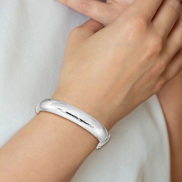 Kazi Luxury Sterling Silver Rhodium-plated D/C 12mm Fancy Hinged Bangle Bracelet